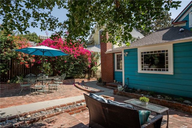 an aerial view of a town with couple of houses