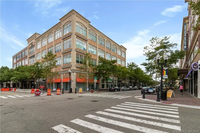 a view of street with sitting area