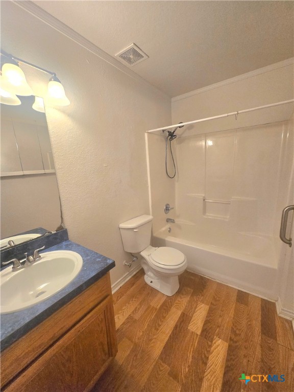 819 South 16th Street Temple, TX 76501 - Photo 6 of 7 a bathroom with a sink a toilet and shower