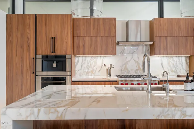 a view of kitchen with wooden floor and chair
