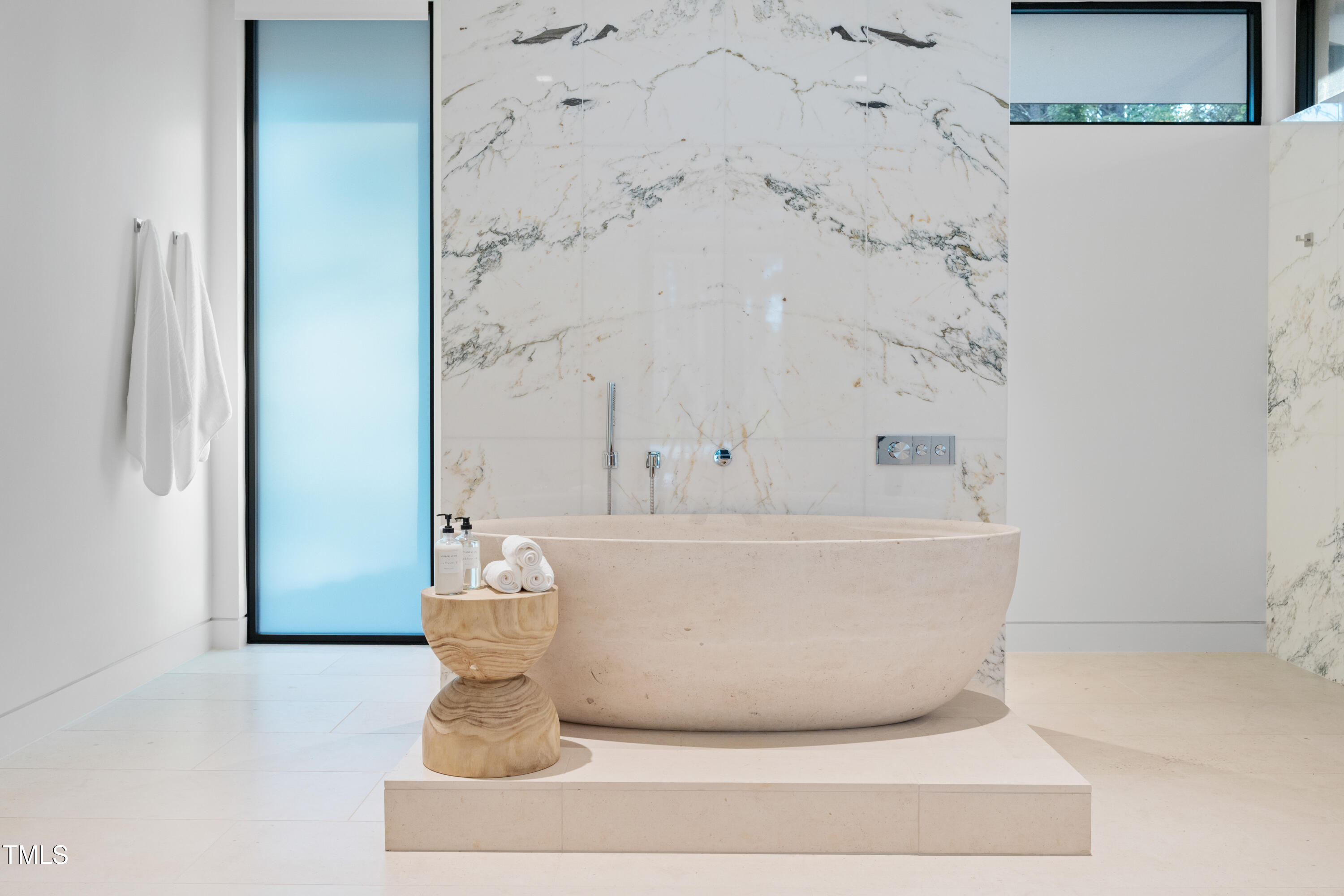 812 Stradella Road Raleigh, NC 27614 - Photo 16 of 35 a white bath tub sitting in a bathroom