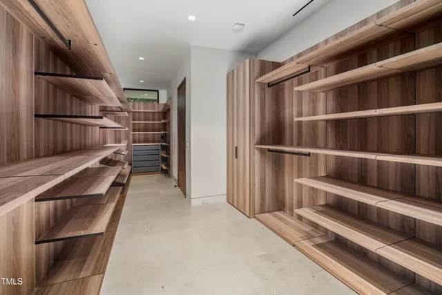 a view of an empty walk in closet