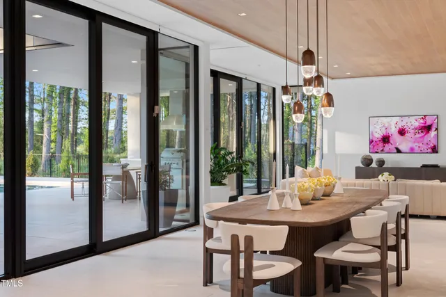 a outdoor dining space with furniture and outdoor view