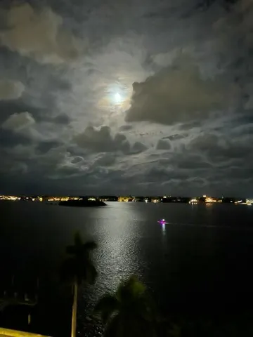 a balcony with view of outdoor space