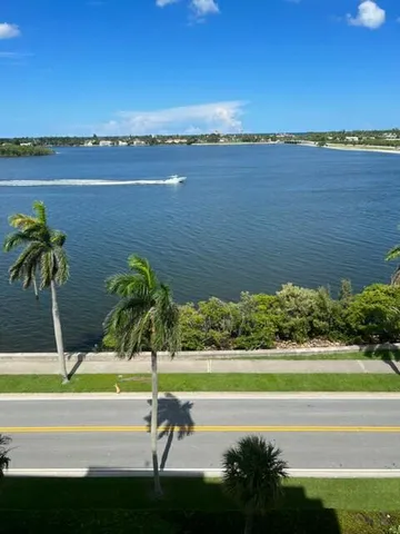 a view of balcony with furniture