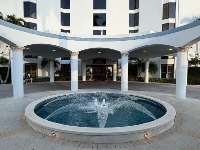 a bathroom with a sink vanity and mirror
