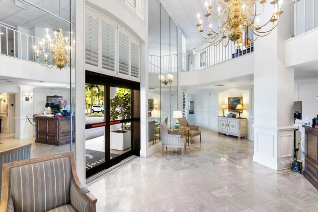 a view of swimming pool with outdoor seating and yard in back