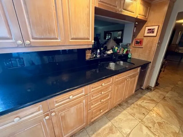 a view of a lake with a yard and outdoor seating