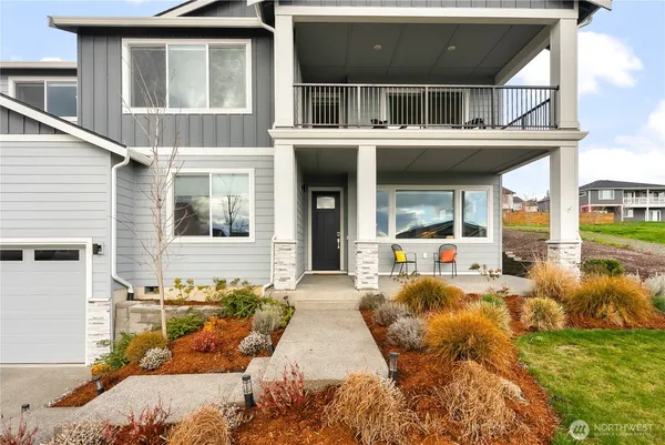 a front view of a house with swimming pool