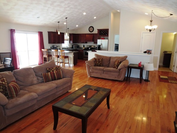 5 Wilbur Road Lincoln, RI 02865 - Photo 3 of 30 a living room with furniture and a wooden floor