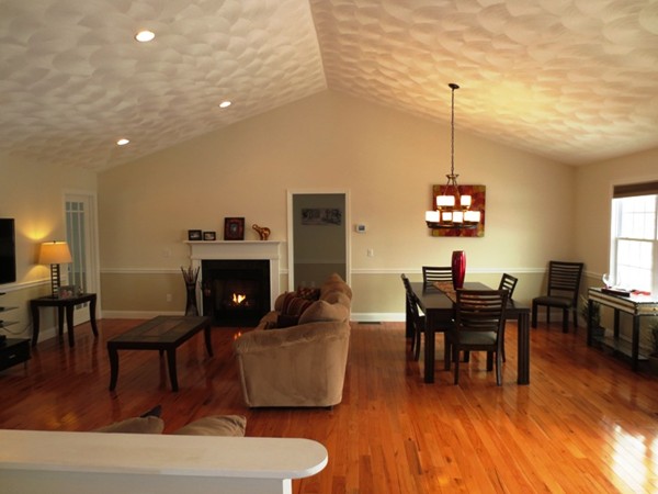 5 Wilbur Road Lincoln, RI 02865 - Photo 7 of 30 a view of a dining room with furniture and chandelier