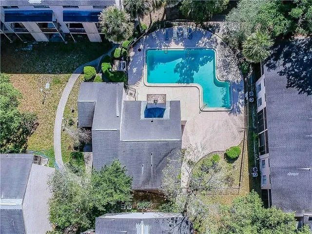 an aerial view of house with yard