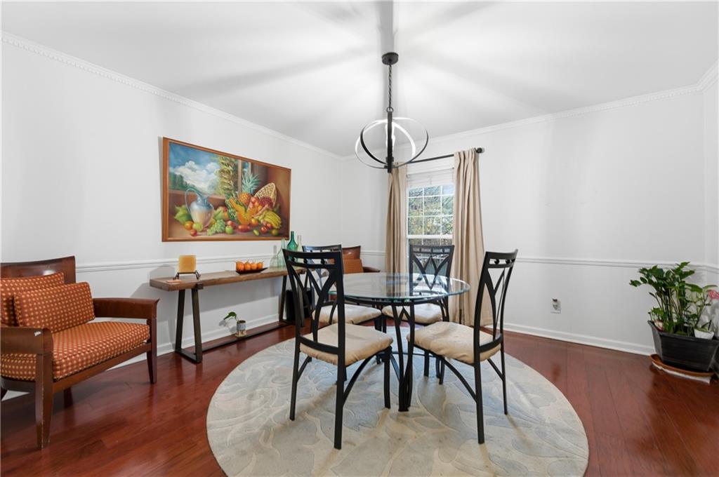 1102 Moorestown Circle Decatur, GA 30033 - Photo 7 of 13 a view of a dining room with furniture window and wooden floor