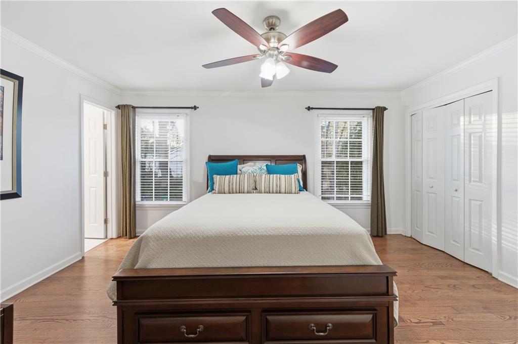 1102 Moorestown Circle Decatur, GA 30033 - Photo 8 of 13 a bedroom with a bed and a large window