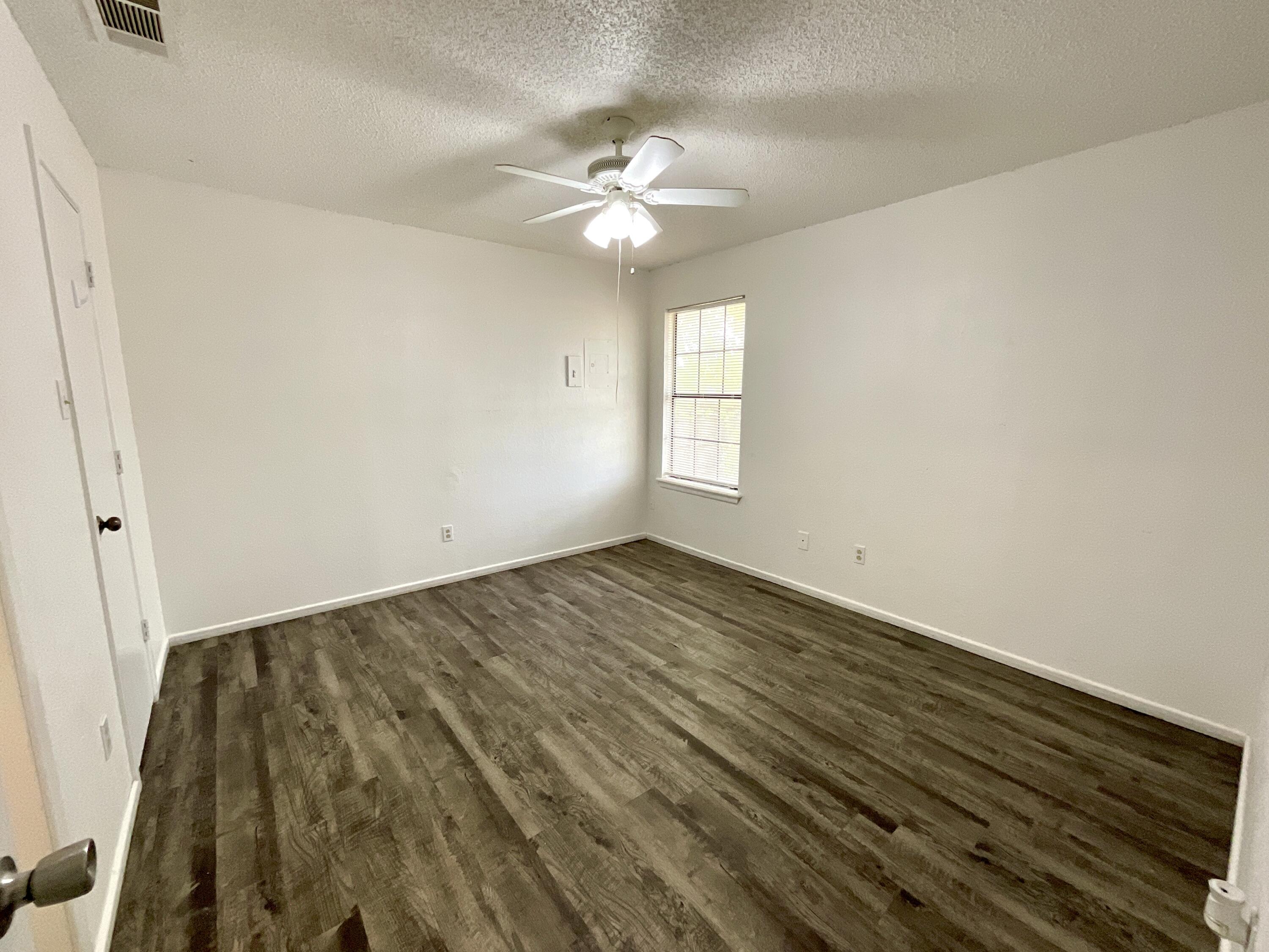 6108 37th Street, Unit B Lubbock, TX 79407 - Photo 3 of 8 a view of a livingroom with a window