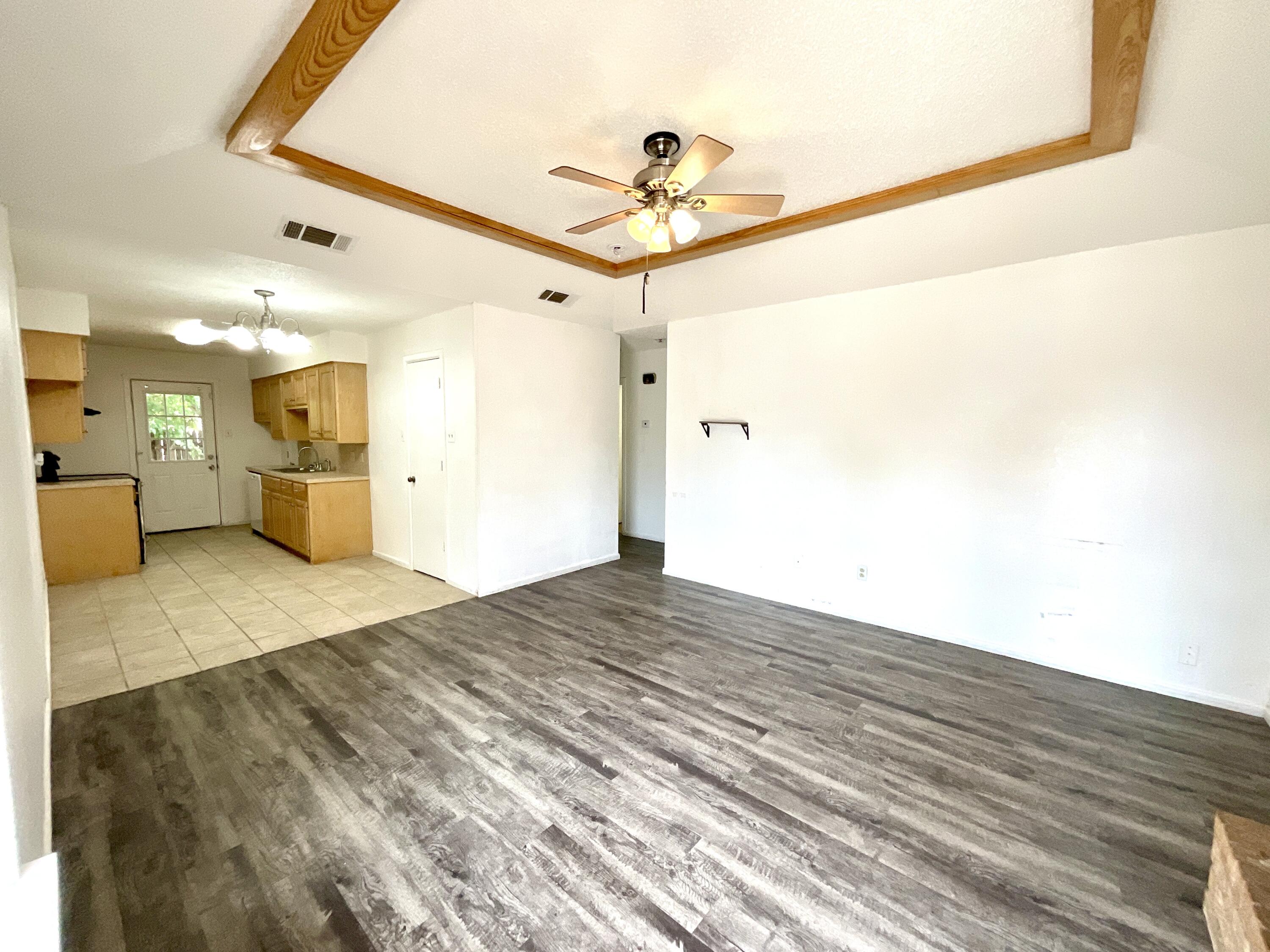 6108 37th Street, Unit B Lubbock, TX 79407 - Photo 4 of 8 a view of a hallway with a window