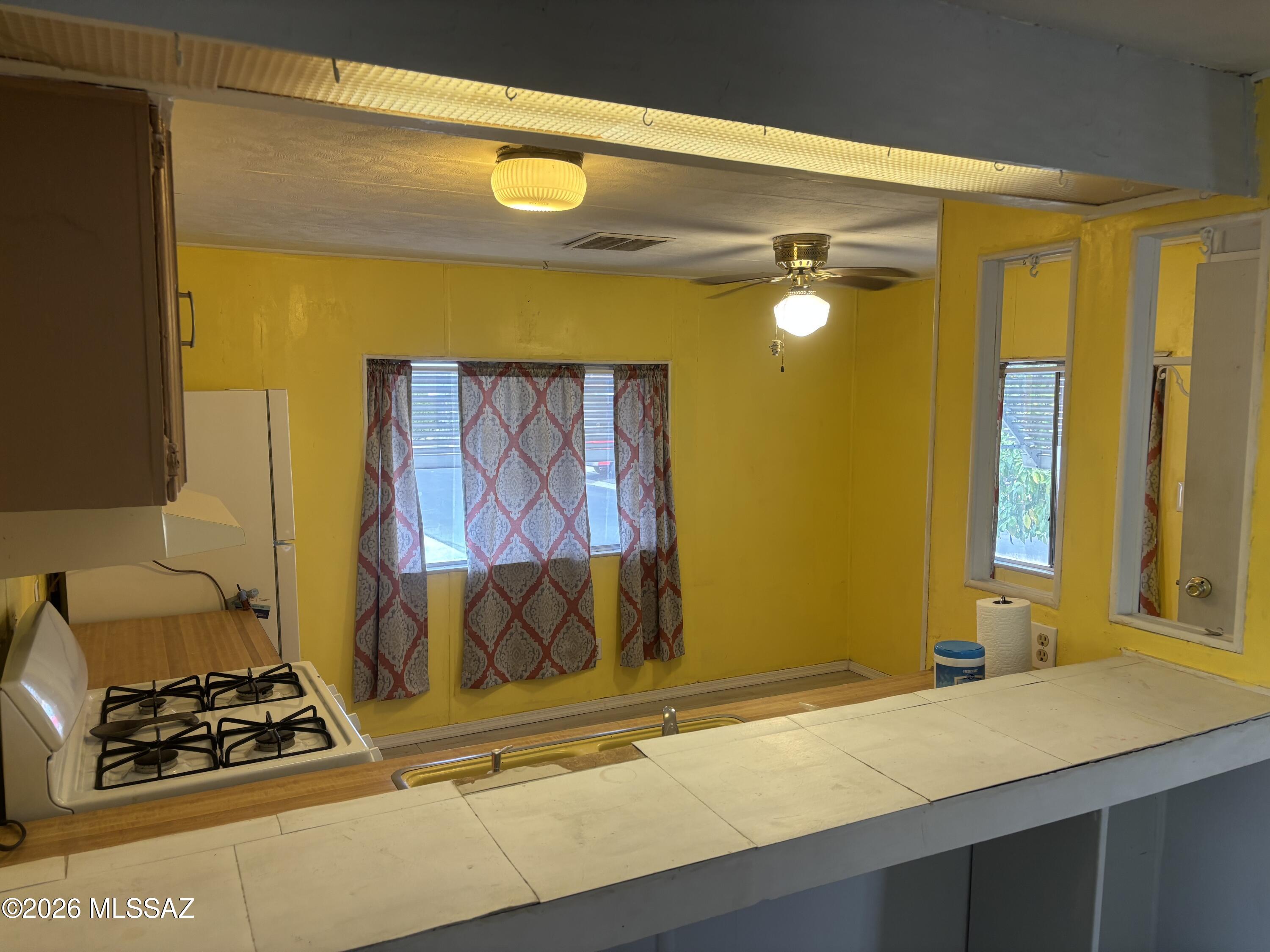 4550 North Flowing Wells Road, Unit 65 Tucson, AZ 85705 - Photo 17 of 50 a bathroom with a sink and a mirror
