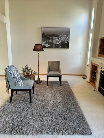 a living room with furniture and a couch