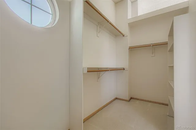 a view of an empty walk in closet