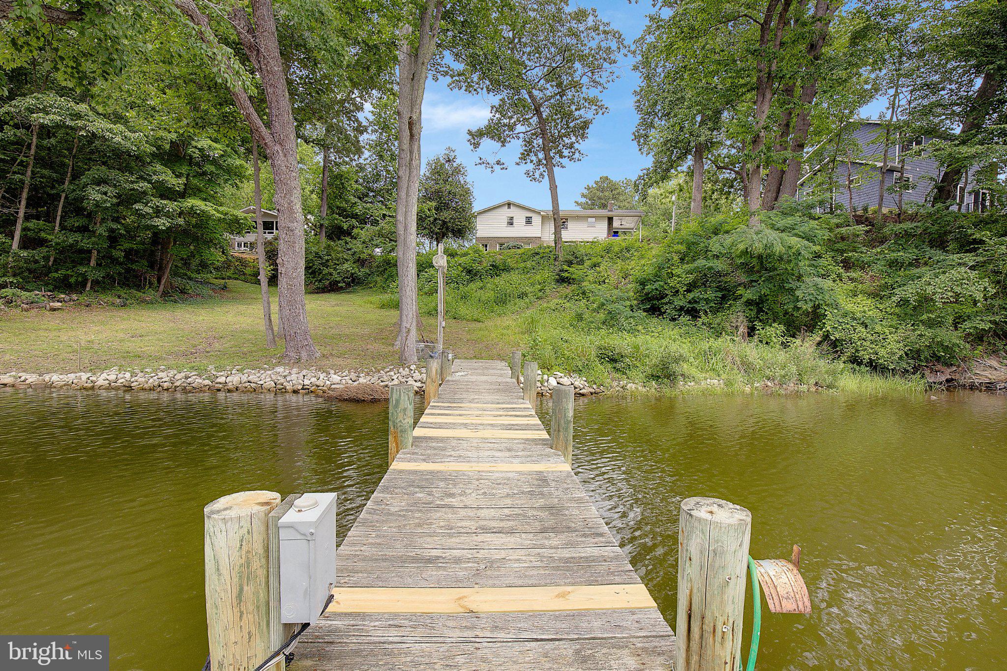 3088 Tudor Hall Road Riva, MD 21140 - Photo 17 of 62 Serene dock by tranquil waters.
