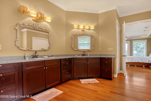 a view of house with swimming pool outdoor seating