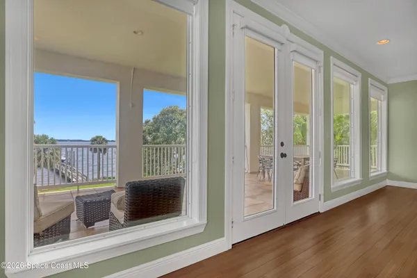 a view of a swimming pool with lounge chair
