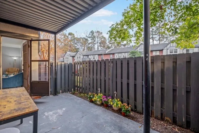 a group of cars parked in front of a house