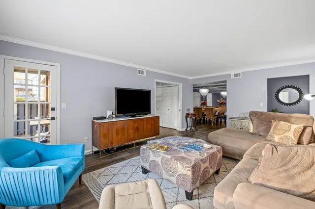 a living room with furniture and a couch