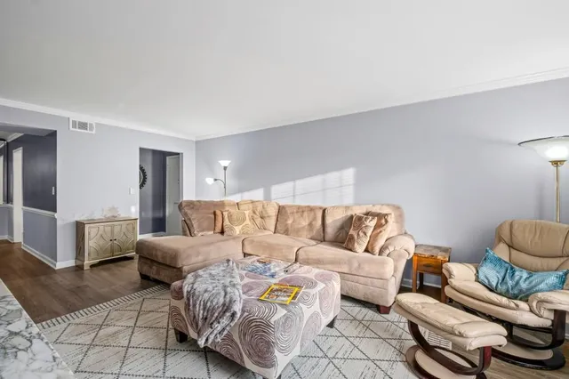 a kitchen with stainless steel appliances a sink cabinets and a counter top space