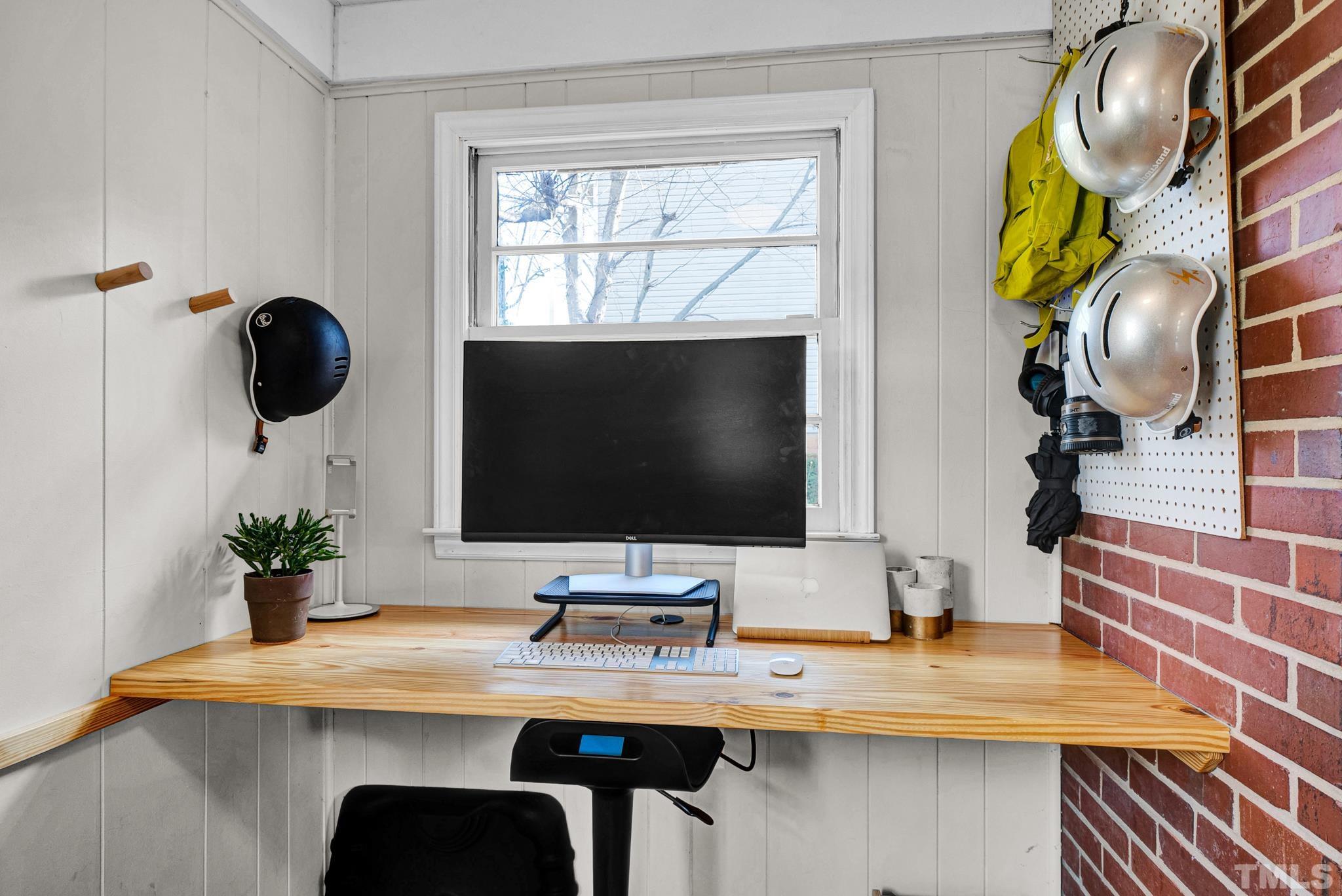 903 Bragg Street Raleigh, NC 27610 - Photo 21 of 37 a view of a workspace with furniture