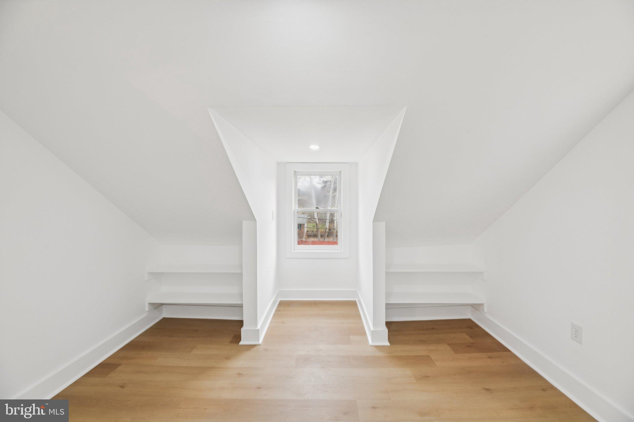 24399 Morgan Road Hollywood, MD 20636 - Photo 15 of 40 wooden floor in an empty room with a window
