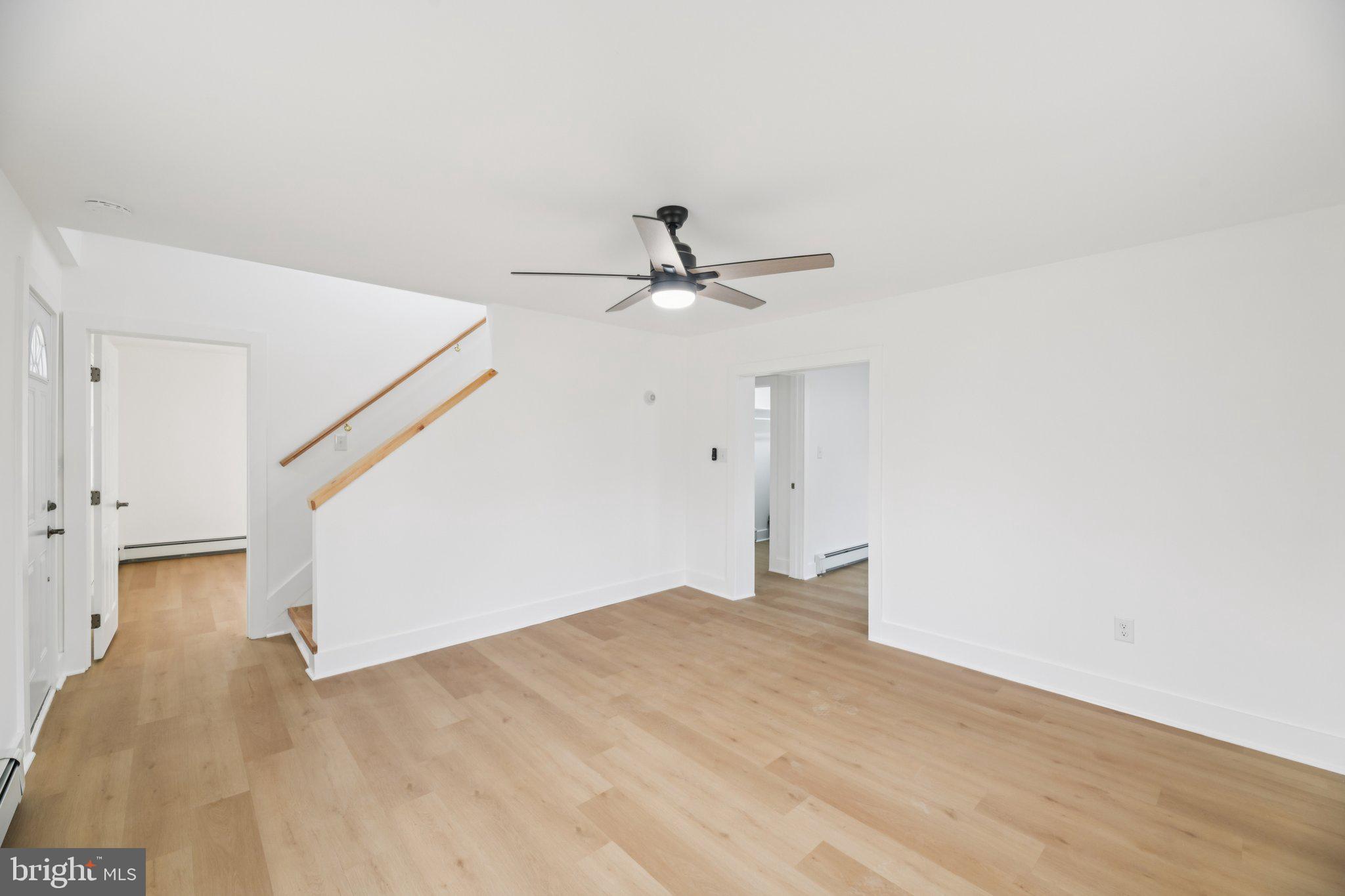 24399 Morgan Road Hollywood, MD 20636 - Photo 31 of 40 a view of empty room with wooden floor and fan
