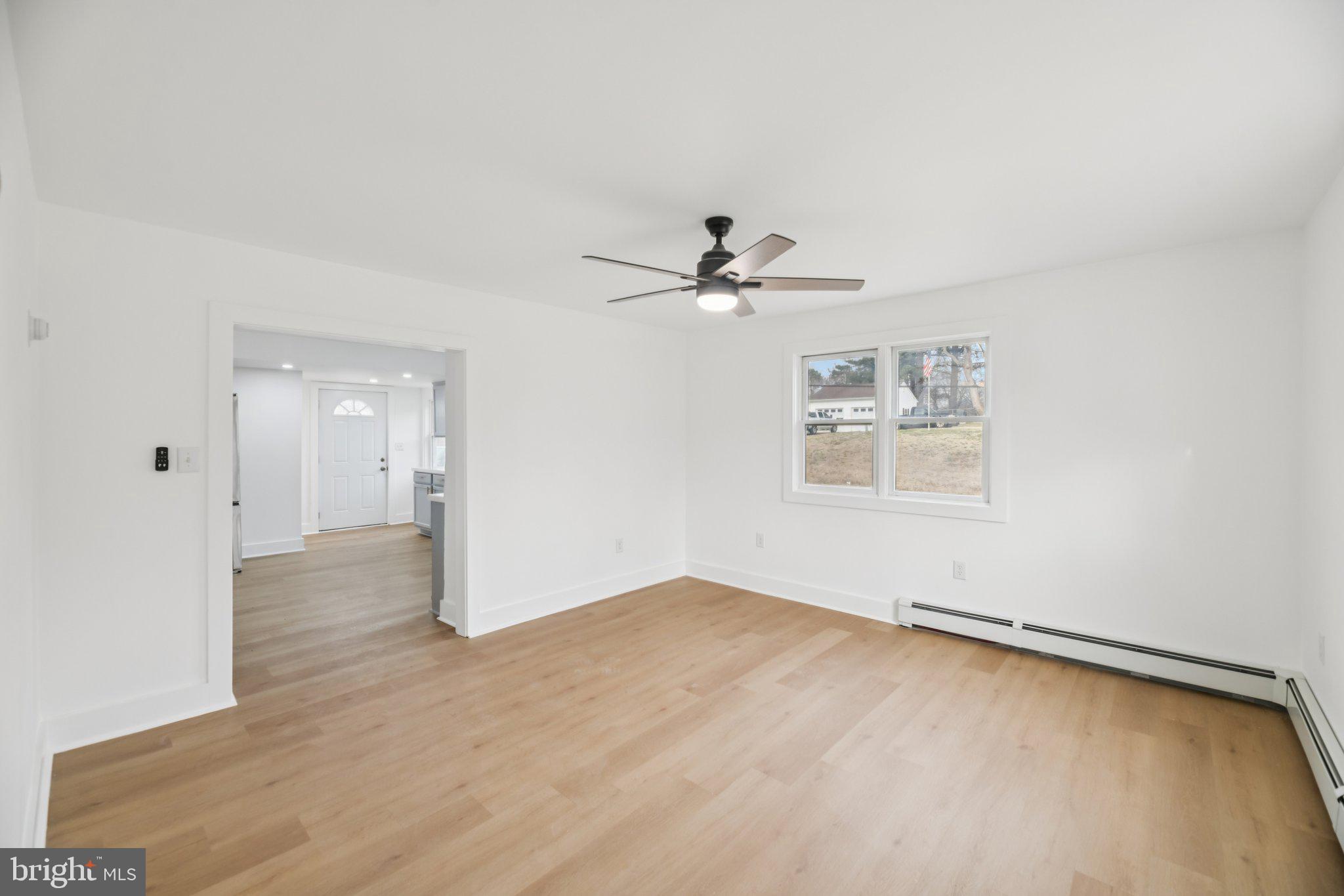 24399 Morgan Road Hollywood, MD 20636 - Photo 32 of 40 wooden floor in an empty room with a window