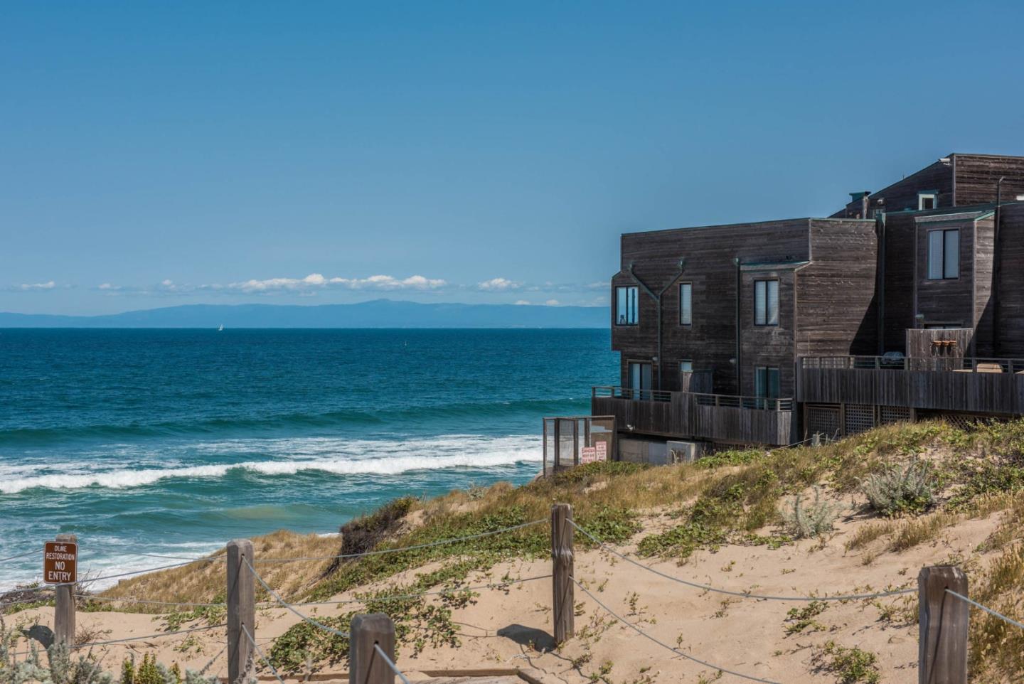 1 Surf Way, Unit 225 Monterey, CA 93940 - Photo 20 of 32 a view of a balcony with an outdoor space