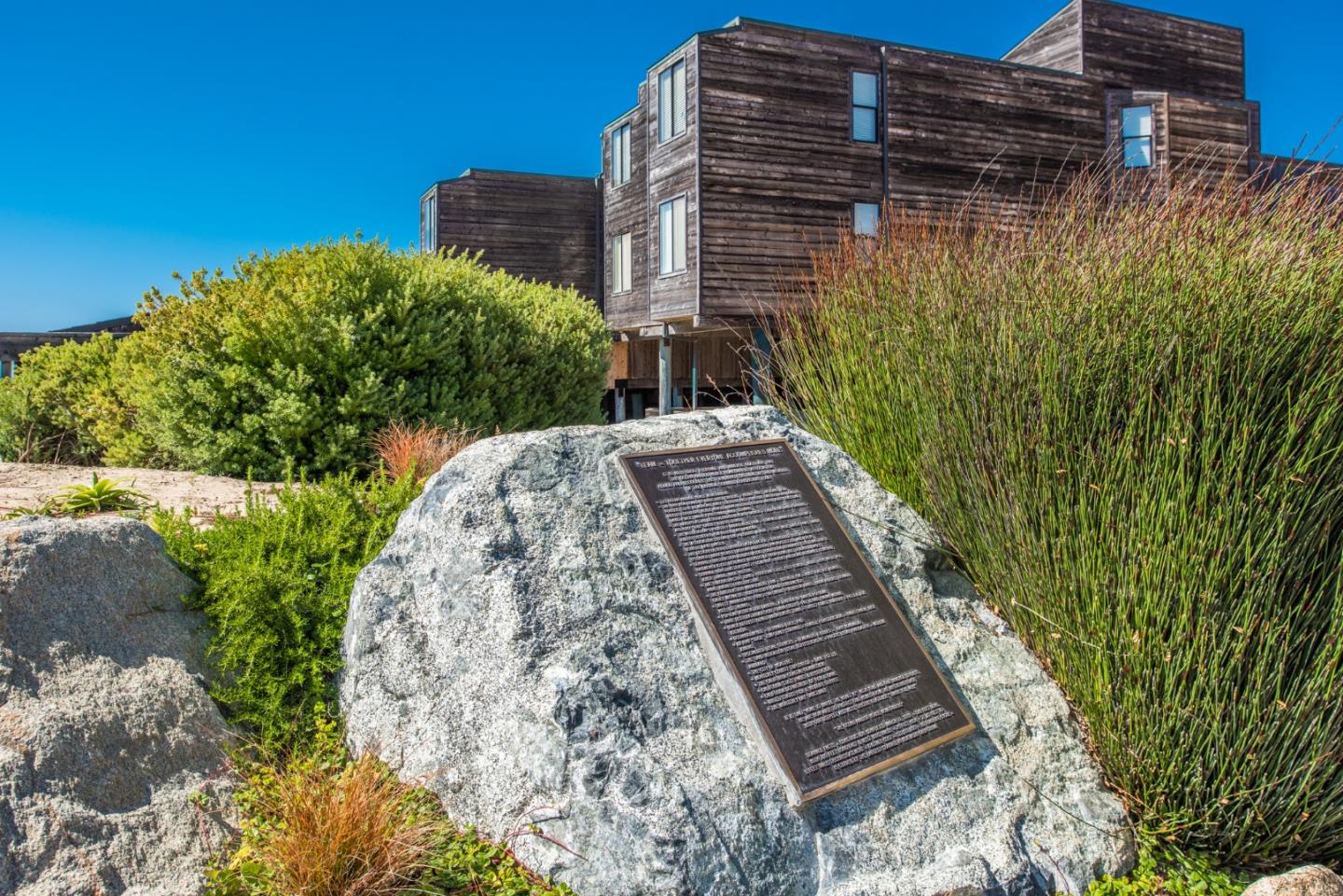 1 Surf Way, Unit 225 Monterey, CA 93940 - Photo 32 of 32 a backyard of a building