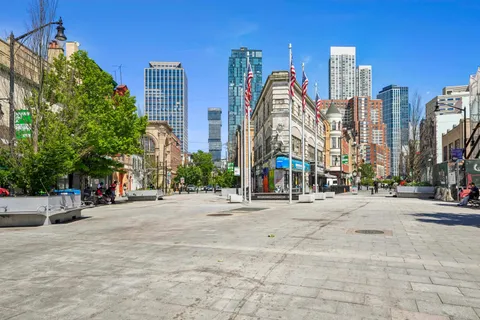 a view of a street with cars
