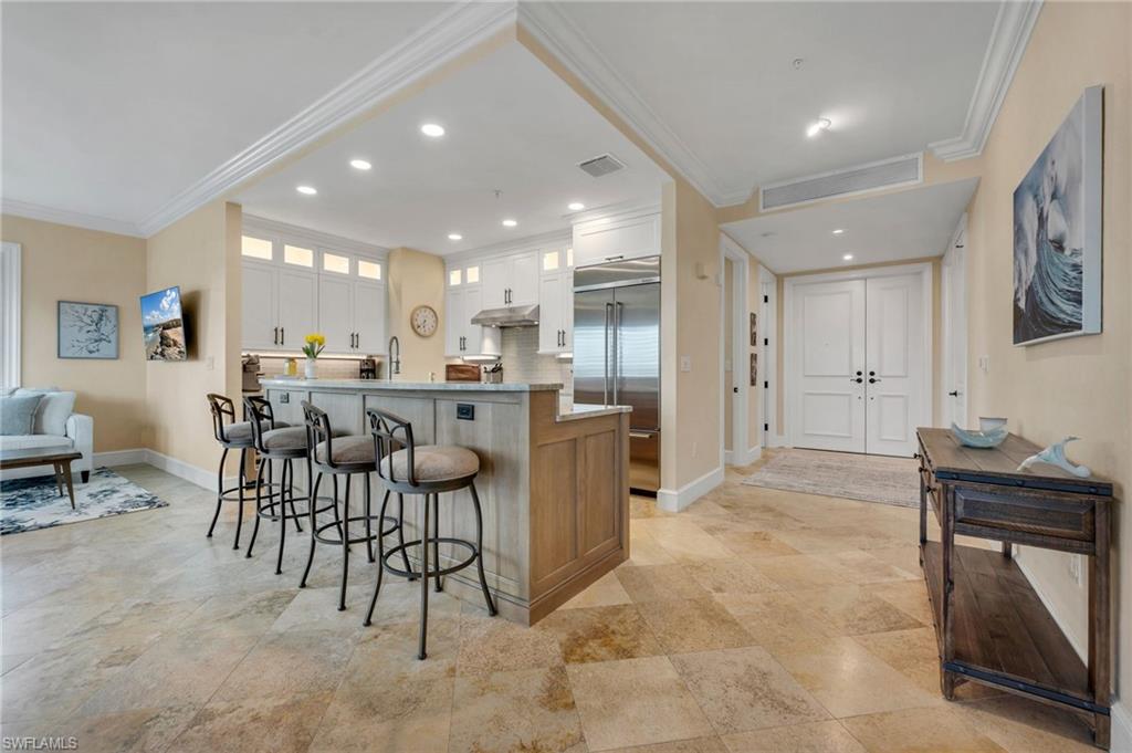 780 5th Avenue South, Unit 302 Naples, FL 34102 - Photo 6 of 20 Breakfast Bar - Kitchen View 3