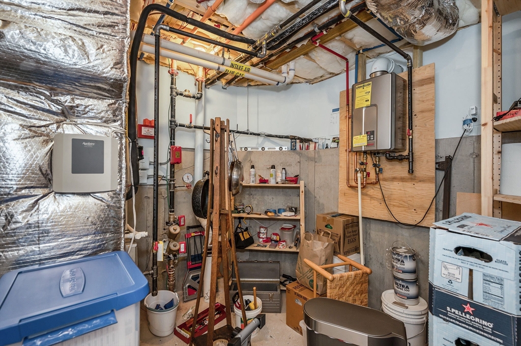 154 Chestnut Street, Unit 9 Lowell, MA 01852 - Photo 25 of 39 a view of walk in closet