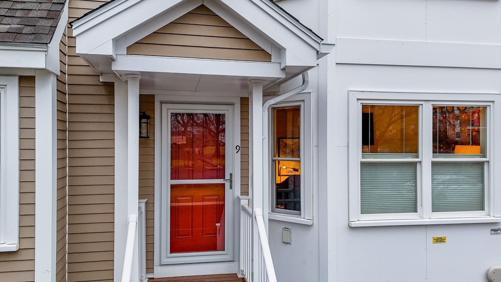 154 Chestnut Street, Unit 9 Lowell, MA 01852 - Photo 39 of 39 a front view of a house with a window