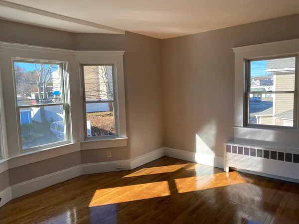 a view of an empty room and window