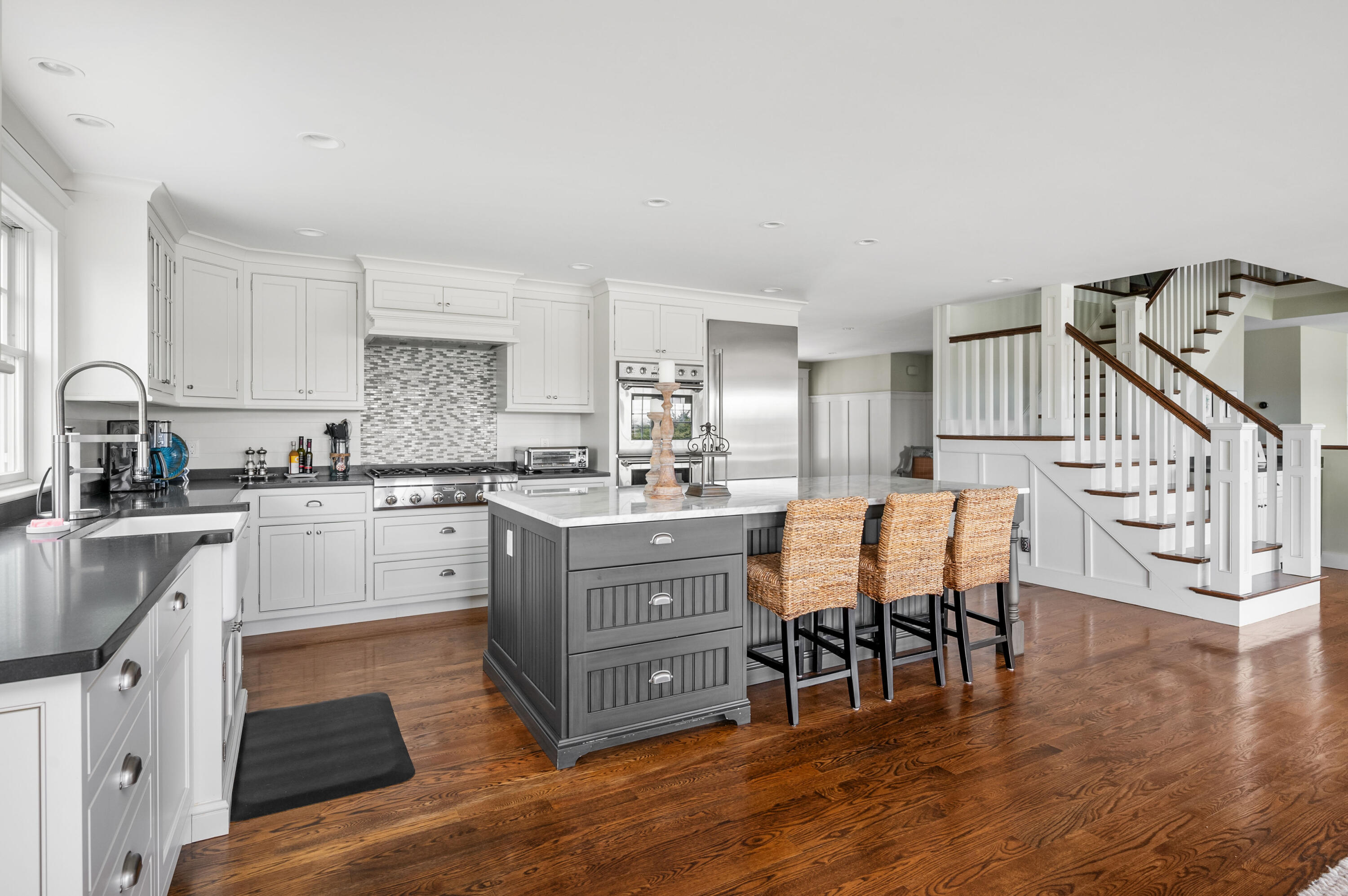 189 Harbor Point Road Barnstable, MA 02675 - Photo 13 of 68 a kitchen with granite countertop a sink appliances cabinets and furniture