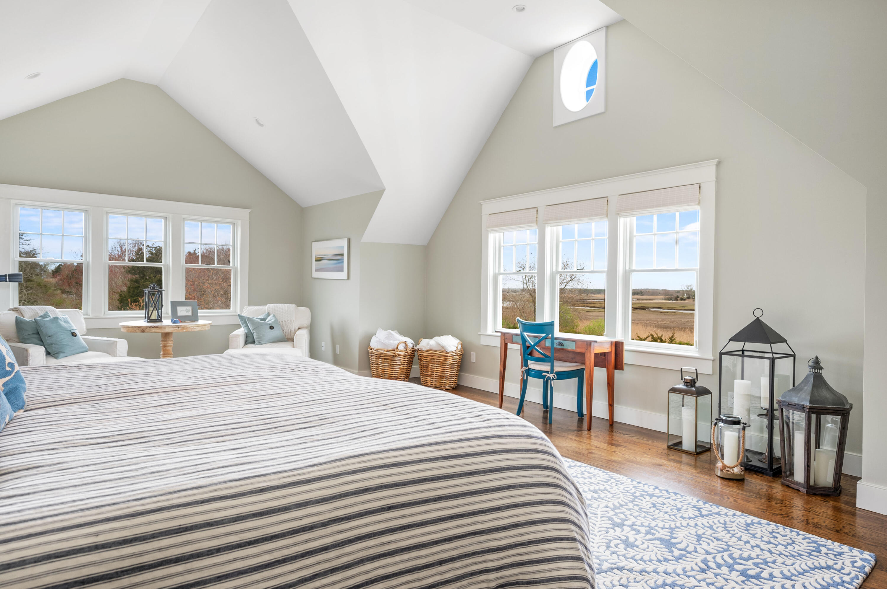 189 Harbor Point Road Barnstable, MA 02675 - Photo 19 of 68 a large bedroom with a large bed a large window and book shelf