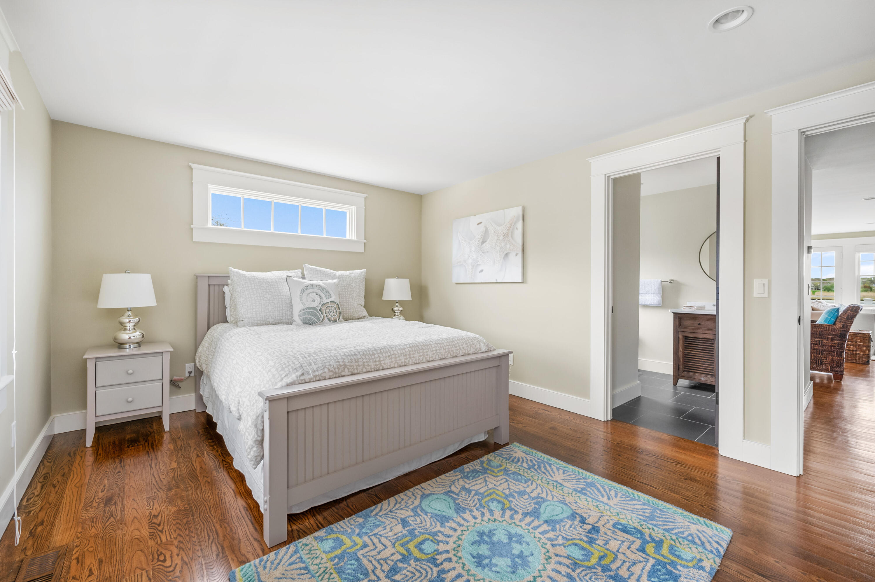 189 Harbor Point Road Barnstable, MA 02675 - Photo 26 of 68 a bedroom with a bed and wooden floor