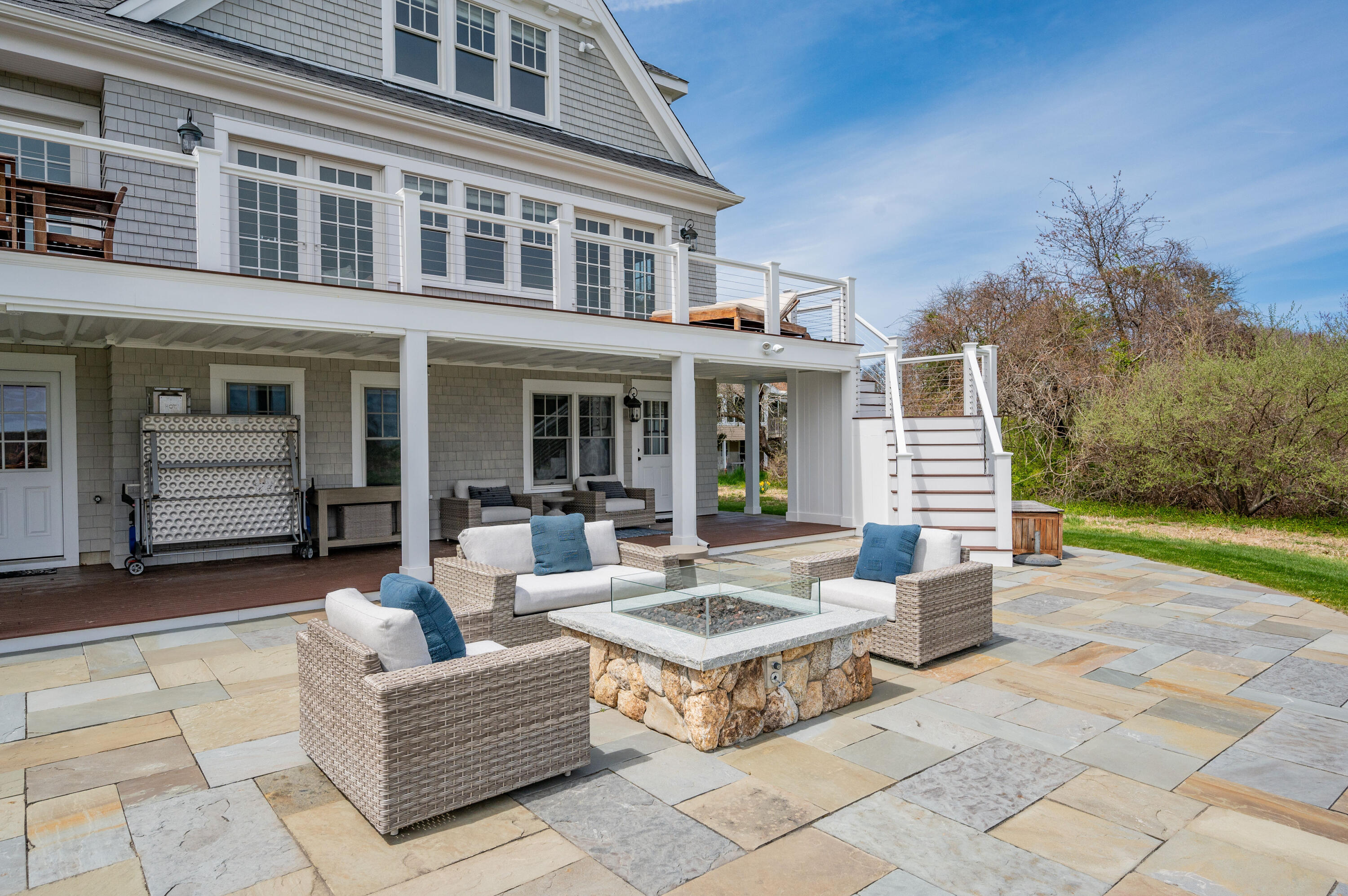 189 Harbor Point Road Barnstable, MA 02675 - Photo 54 of 68 a view of a building with couches in a patio