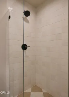 a patio with table and chairs