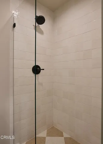 a patio with table and chairs