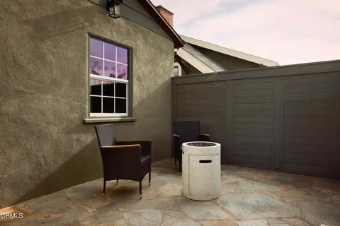 a view of a livingroom with furniture and wooden floor