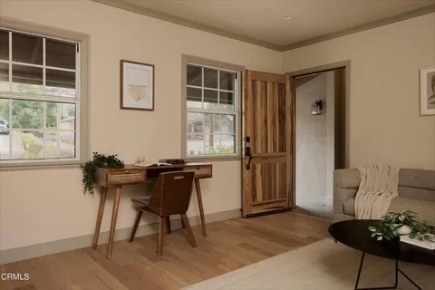 a living room with a couch and a table