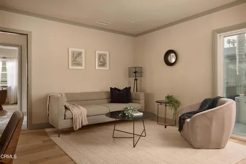 a kitchen with a table and chairs