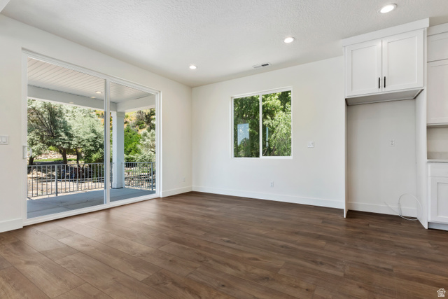 504 North 650 E Street Springville, UT 84663 - Photo 10 of 36 Spacious interior featuring wood-finish flooring, white walls, and recessed lighting